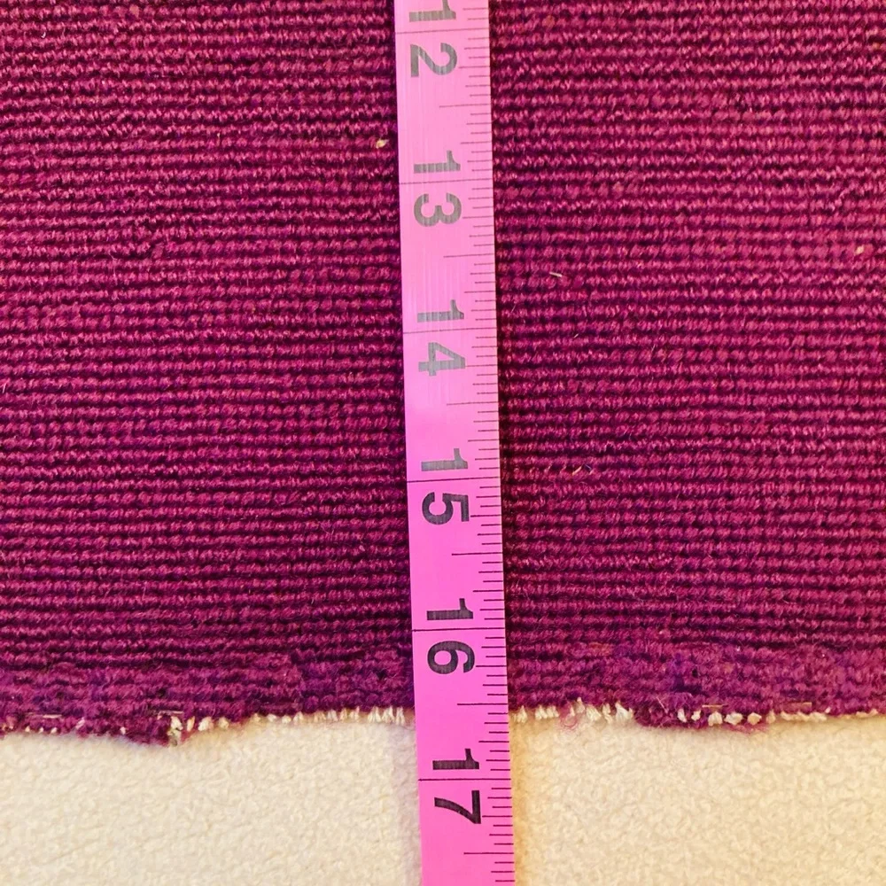 Beautiful vintage finished embroidery on burgundy wool, in fanciful floral’s